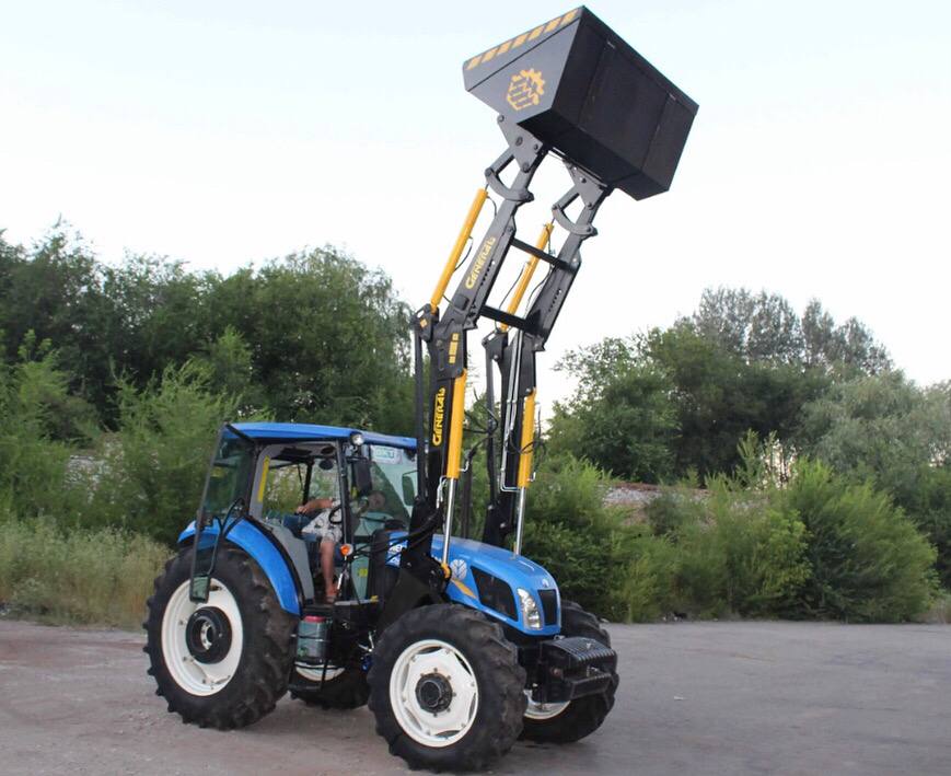 Быстросъемный фронтальный погрузчик КУН GENERAL X на трактор New Holland с ковшом - фото №9 Быстросъемный фронтальный погрузчик КУН GENERAL X на трактор New Holland с ковшом - фото №9